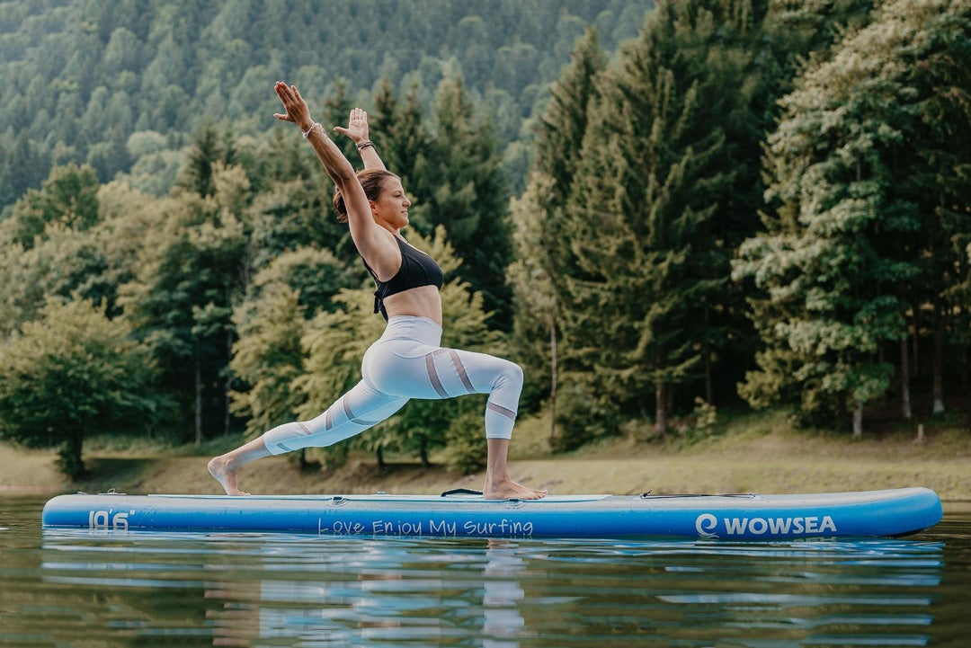 Doing pilates on a stand-up paddle (sup) board